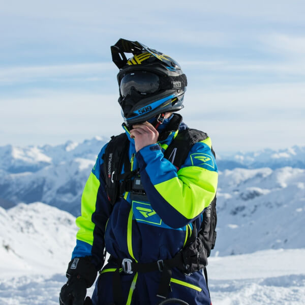 Skier wearing goggles in the snowy mountains